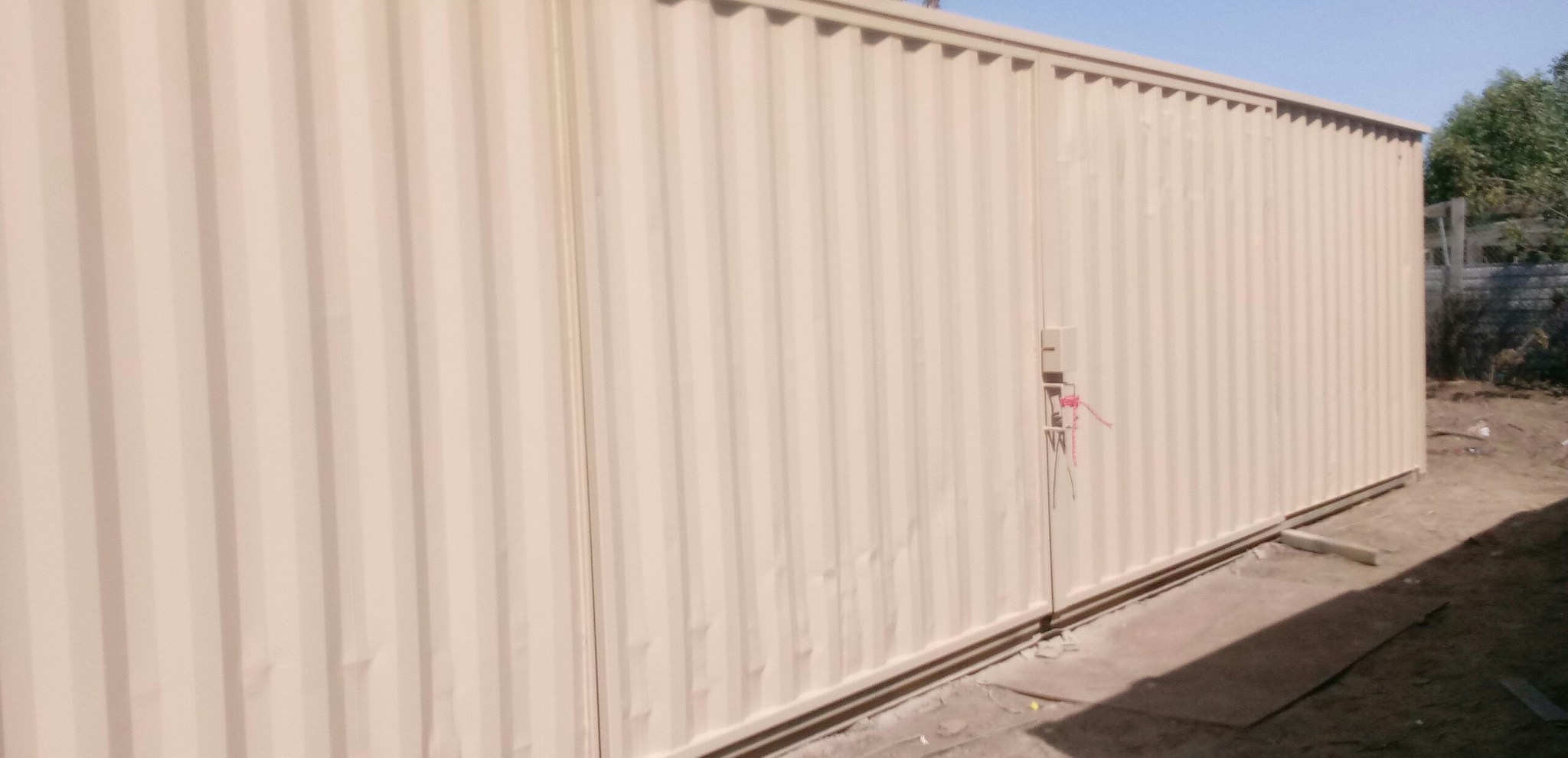 Shipping container sliding door